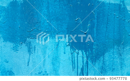 Blue painted wall texture with stains and smudges 93477778