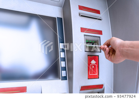 Atm machine money. Hand holding money bank credit card. Withdraw money cash from atm. Us dollar bill, bank credit card. 93477924