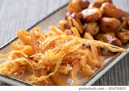 Assorted snacks. Saki squid and squid beans. Assorted snacks. Saki squid and squid beans. 93478903