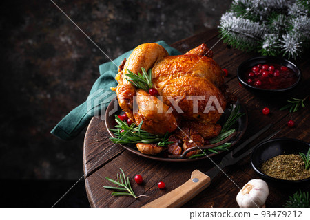 Christmas baked chicken for festive dinner. 93479212
