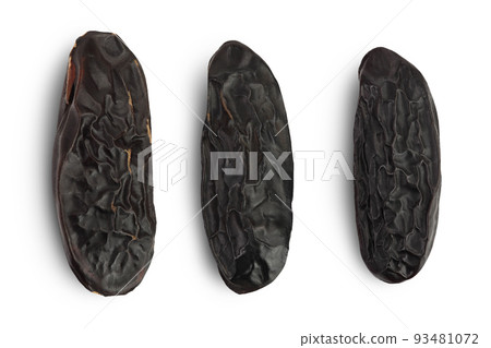 Tonka bean isolated on white background with full depth of field. Bean of Dipteryx odorata. Top view. Flat lay 93481072