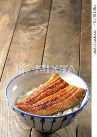 A simple eel rice bowl with grilled eel on top of white rice. A simple eel rice bowl with grilled eel on top of white rice. 93481665