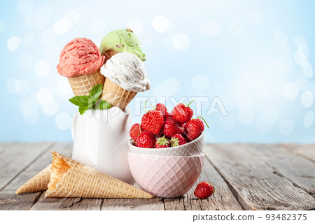 Various ice cream in waffle cones Various ice cream in waffle cones 93482375