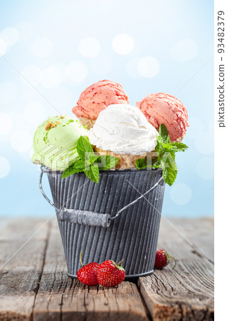 Various ice cream in waffle cones Various ice cream in waffle cones 93482379