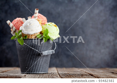 Various ice cream in waffle cones Various ice cream in waffle cones 93482381
