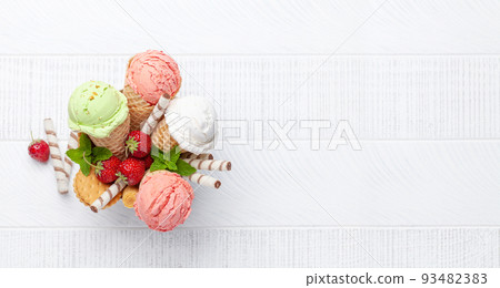Various ice cream in waffle cones Various ice cream in waffle cones 93482383