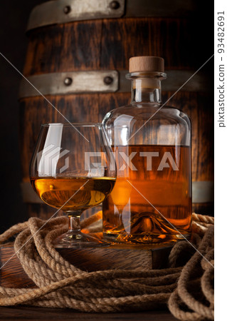 Glass and bottle with cognac Glass and bottle with cognac 93482691