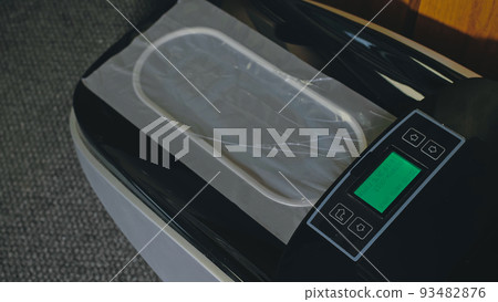 Automatic Thermal Shrinkable Shoe Cover Laminating Machine. Clos Automatic Thermal Shrinkable Shoe Cover Laminating Machine. Clos 93482876
