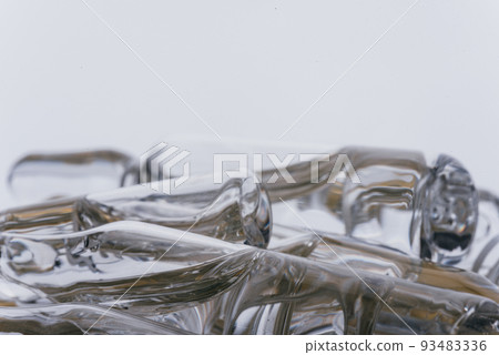 Glass medical ampoule vial for injection. Medicine is liquid sodium chloride with of aqueous solution in ampulla. Close up. Bottles ampule multicolor. Glass medical ampoule vial for injection. Medicine is liquid sodium chloride with of aqueous solution in ampulla. Close up. Bottles ampule multicolor. 93483336