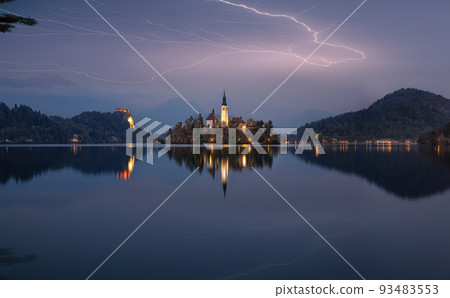 Astonishing night view of popular tourist destination Bled lake. Astonishing night view of popular tourist destination Bled lake. 93483553