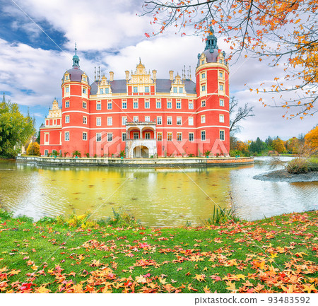 Captivating autumn landscape with Muskau castle. Captivating autumn landscape with Muskau castle. 93483592