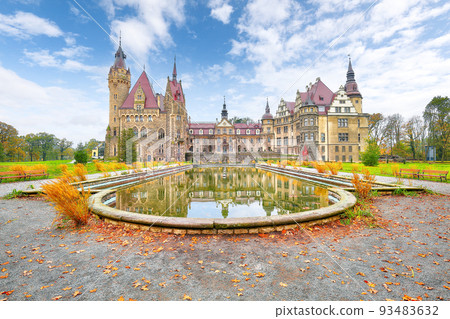 Fabulous autumn landscape with Moszna Castle. Fabulous autumn landscape with Moszna Castle. 93483632