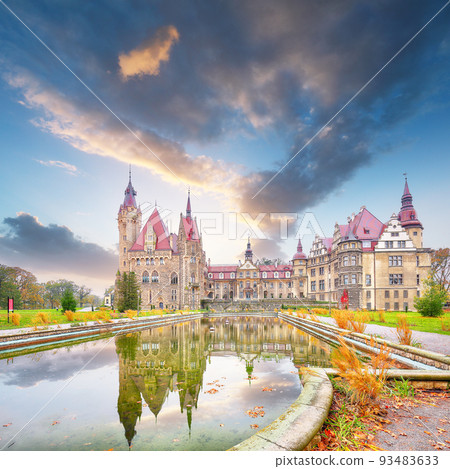 Astonishing autumn landscape with Moszna Castle. Astonishing autumn landscape with Moszna Castle. 93483633