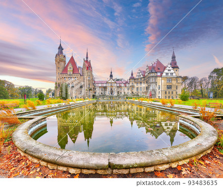 Astonishing autumn landscape with Moszna Castle. Astonishing autumn landscape with Moszna Castle. 93483635