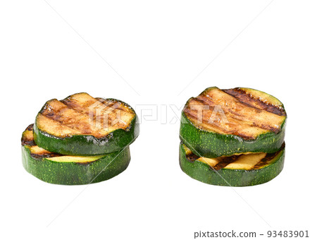 Grilled organic zucchini slices isolated on white background. 93483901