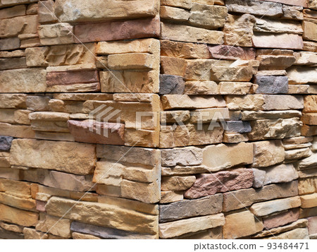 Artificial stone cladding. Designed to resemble real stone. Arranged vertically and attached to the wall with a special adhesive. Used as decoration on the walls of buildings. 93484471