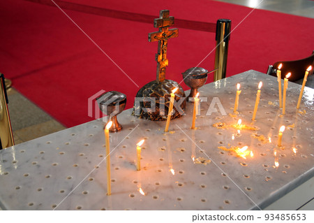 Close up of yellow Burning candles 93485653