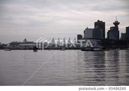 Dramatic Canada Palace from the sea in a white sky day Dramatic Canada Palace from the sea in a white sky day 93486260