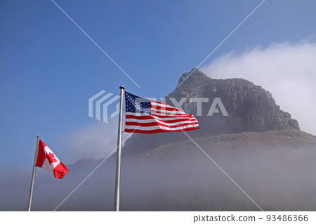American and Canadian flags at Logan Pass American and Canadian flags at Logan Pass 93486366