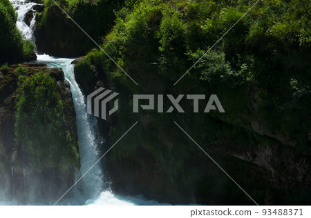 a magnificent waterfall called strbacki buk on the beautifully clean and drinking Una river in Bosnia and Herzegovina in the middle of a forest. a magnificent waterfall called strbacki buk on the beautifully clean and drinking Una river in Bosnia and Herzegovina in the middle of a forest. 93488371