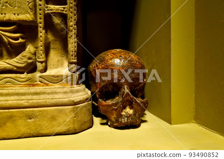 Close-up on a human skull made of metal. Close-up on a human skull made of metal. 93490852