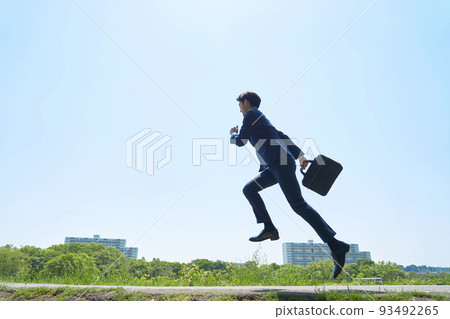 businessman running outside 93492265
