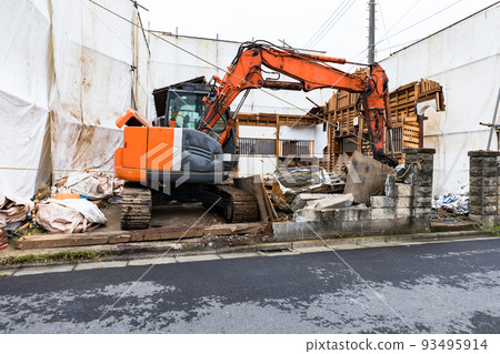 House demolition construction site Heavy excavator 93495914