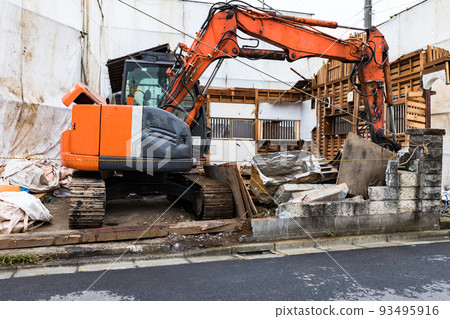 House demolition construction site Heavy excavator 93495916