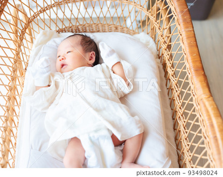 Baby in a cradle Newborn 15 days after birth Baby in a cradle Newborn 15 days after birth 93498024