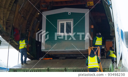 Loading cargo into a cargo plane. 93498230