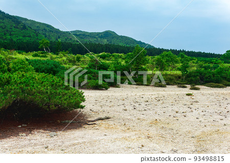 landscape of Kunashir island, tephra beach of a hot lake at the bottom of Golovnin volcano caldera 93498815