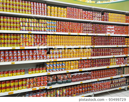SELANGOR, MALAYSIA -JULY 6, 2022: Selective focused on sardine fish can. The fish has been processed, cook and packed in the can. Displayed on the rack for sale and tag with the price tag SELANGOR, MALAYSIA -JULY 6, 2022: Selective focused on sardine fish can. The fish has been processed, cook and packed in the can. Displayed on the rack for sale and tag with the price tag 93499729