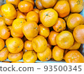texture of oranges on market showcase. artistic blur, selective focus 93500345