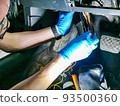 electrician master repairs cables in modern car 93500360