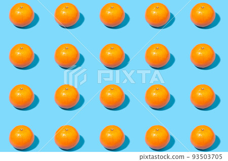 Tangerines on a bright blue background 93503705