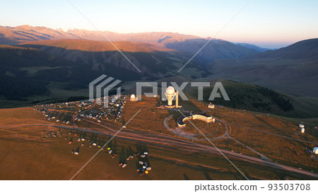 Bright dawn over the observatory in the mountains 93503708