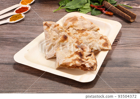Indian traditional tandoori bread - Roti Indian traditional tandoori bread - Roti 93504372