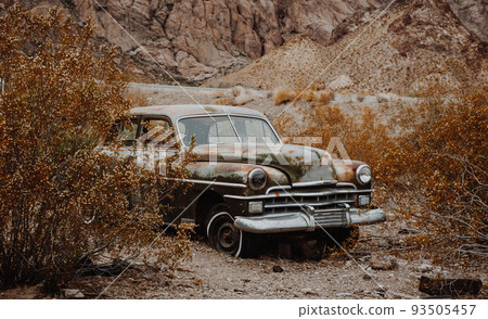 Old vintage car truck abandoned in the desert Old vintage car truck abandoned in the desert 93505457