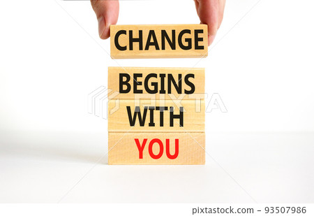 Change begins with you symbol. Concept words Change begins with you on wooden blocks on beautiful white table white background. Businessman hand. Business motivational change begins with you concept. 93507986