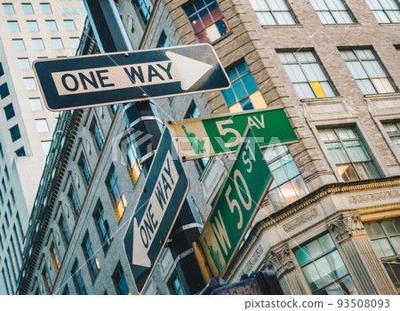 Street sign of Fifth Ave and West 50ST with skylines in background.- New York, USA Street sign of Fifth Ave and West 50ST with skylines in background.- New York, USA 93508093