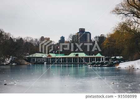 Central Park Boathouse and iced lake in New York City, USA 93508099