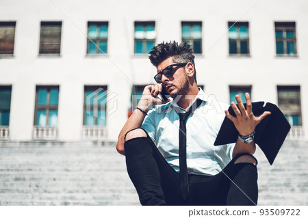 Depressed unsuccessful businessman feels terrible headache, hands shocked by bankruptcy stock downfall sitting on stone stairs. Stressed tired man feels despair lost money online or got problem debt. Depressed unsuccessful businessman feels terrible headache, hands shocked by bankruptcy stock downfall sitting on stone stairs. Stressed tired man feels despair lost money online or got problem debt. 93509722