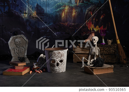 Dark Halloween decor with a grave Dark Halloween decor with a grave 93510365