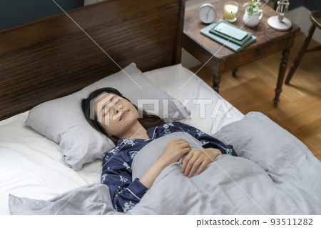 A middle-aged woman sleeping with a calm expression Sleeping face 93511282