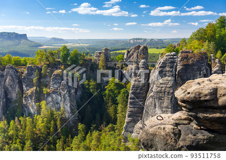 Panorama view of the Bastei. The Bastei is a famous rock formation in Saxon Switzerland National Park, Germany 93511758