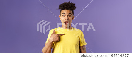 Who me, no way. Portrait of surprised, happy rejoicing young man looking with disbelies as being chosen from all candidates, pointing at himself open mouth fascinated, purple background 93514277