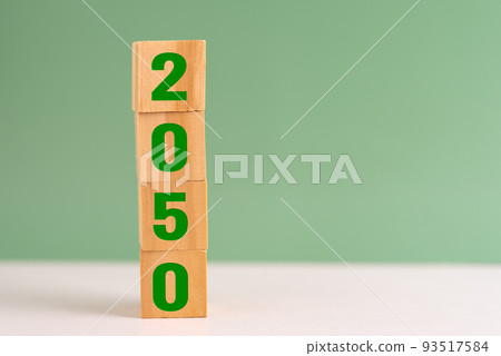 wood cube block net zero target 2050 environmental strategy economy and carbon credit on table background concept. wood cube block net zero target 2050 environmental strategy economy and carbon credit on table background concept. 93517584