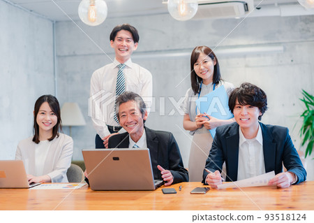 Business person happily working in the office 93518124