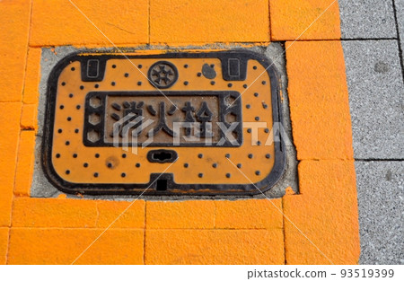 A fire hydrant cover installed under the road, painted yellow to catch your eye A fire hydrant cover installed under the road, painted yellow to catch your eye 93519399
