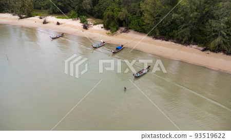 Many fishing boats near the seashore in tropical islands. Pier of the villagers on the southern island of Thailand. top view from drones. 93519622